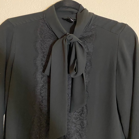 black blouse with neck tie
